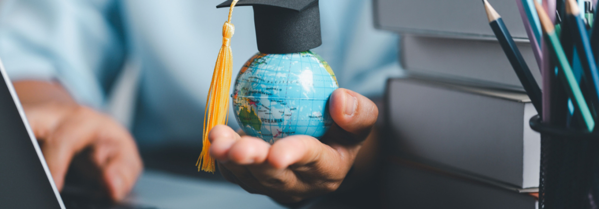 Graduation cap with Earth globe. Concept of global business study, abroad educational, Back to School. Education in Global world, Study abroad business in universities in worldwide. language study